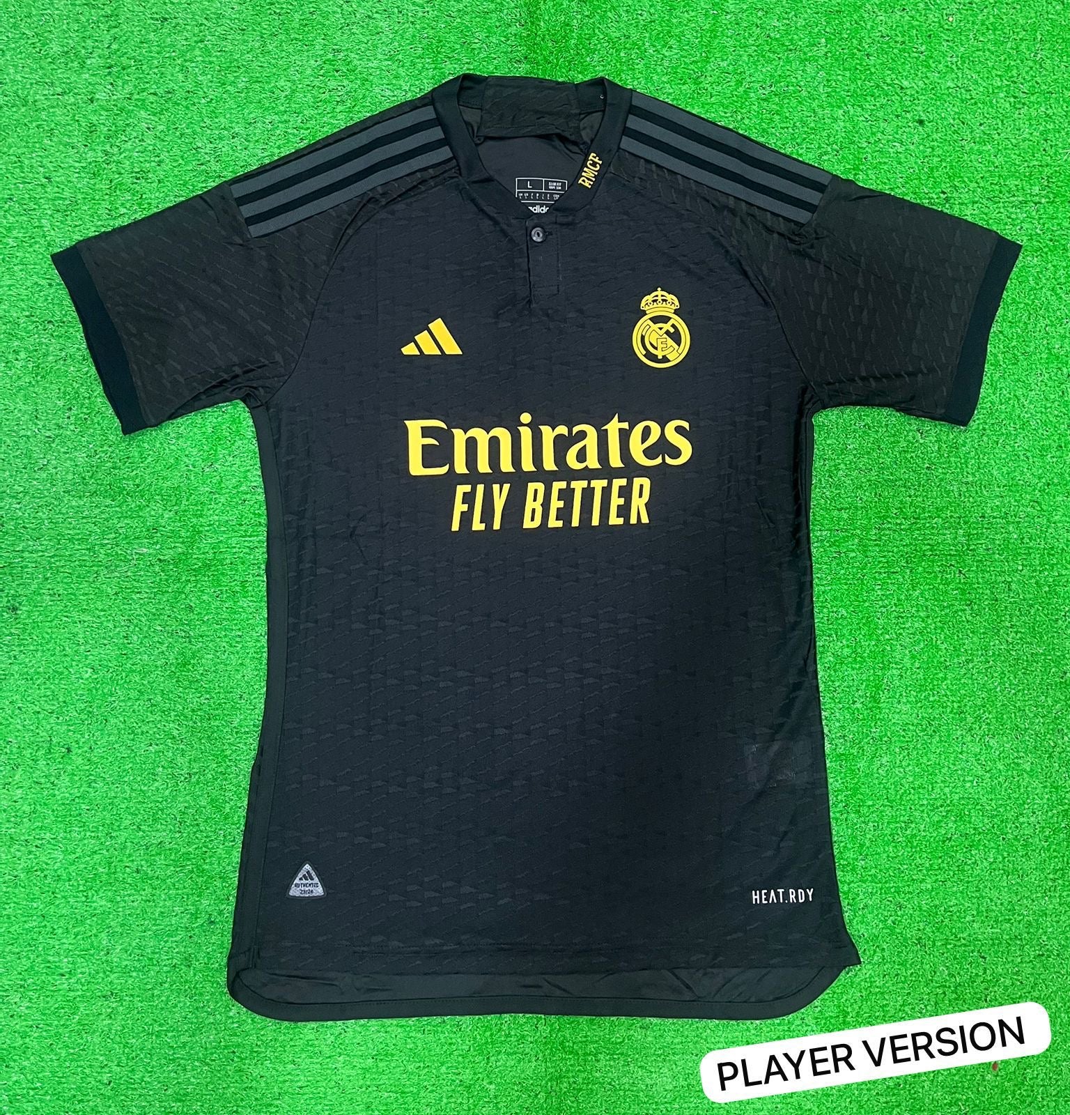 Real Madrid 2023/24 third jersey in black with yellow ascents